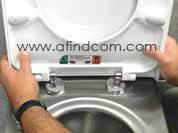 Position the toilet seat on the mounting hinges when the toilet seat is in the open position. Firmly press down on the hinges making sure they are in position. Close the toilet seat making sure not to lift the toilet seat out of position.